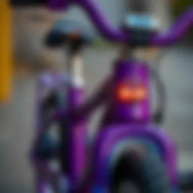 Close-up of a purple bicycle with safety features highlighted, emphasizing child safety.