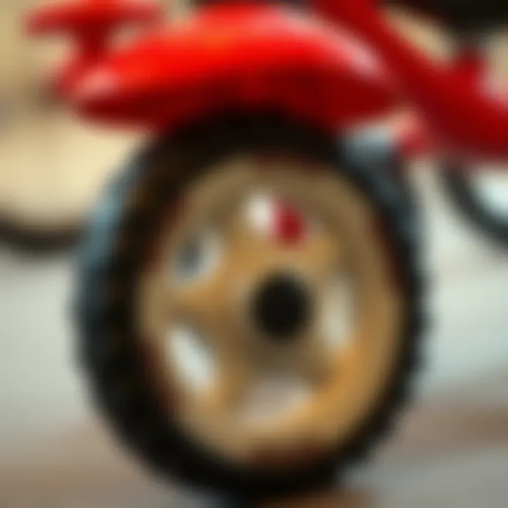 Close-up of a tricycle's wheel, emphasizing safety features.