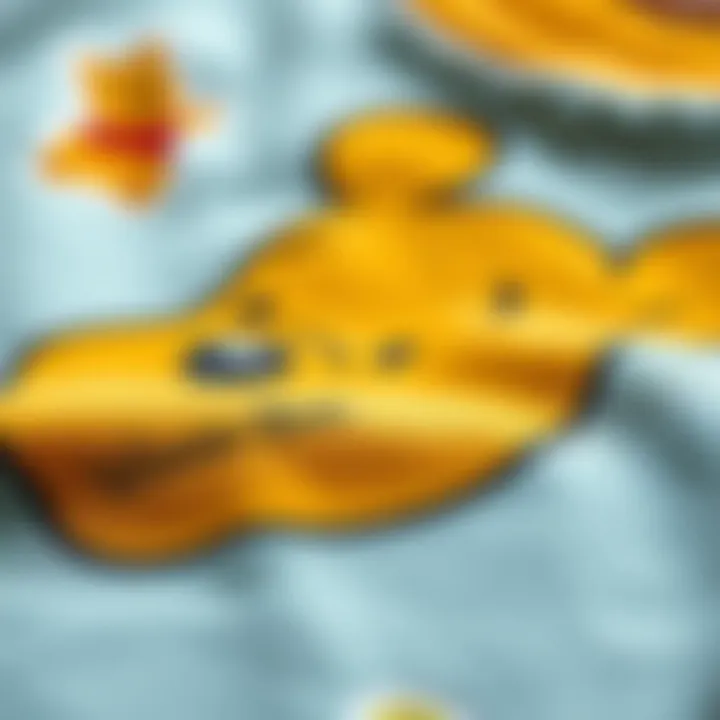 A close-up of the fabric texture of a Winnie the Pooh t-shirt.